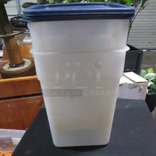 22qt food storage container with lid, translucent plastic, dark blue lid, excellent condition, marked "2XBID".