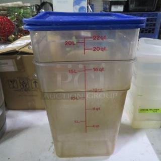 22qt food storage container with blue lid, clear body, marked with measurement scales. Used condition, model 2XBID.