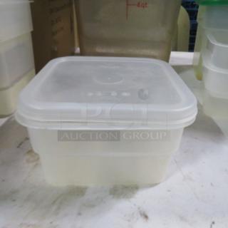 Clear 2qt food storage container with lid, square shape, durable plastic, stackable design, ideal for kitchen use.