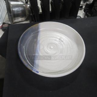 10.5-inch round plate with assorted colors, featuring a speckled design. In good condition, model 10XBID.