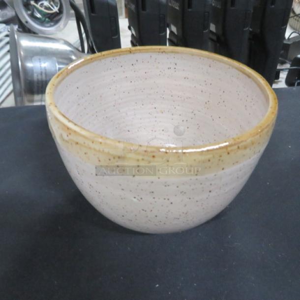 New 6-inch ceramic cereal bowl with speckled finish and gold rim, in pristine condition.