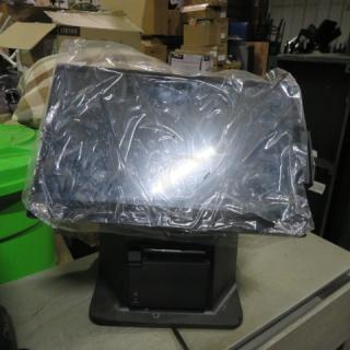 Toast ALL IN ONE POS Terminal wrapped in plastic, with TP200 Thermal Printer. Appears new, on display table.