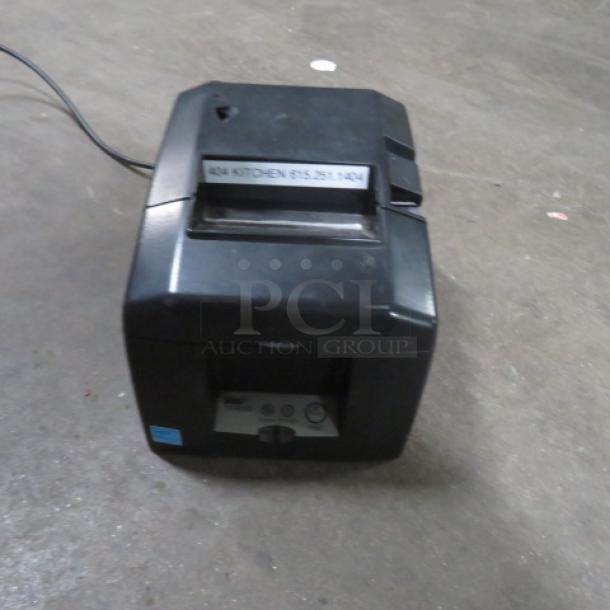 Star TSP650 thermal printer, black, with visible hole on top. "424 KITCHEN" label attached. Used condition.