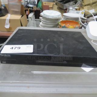 Araknis Gigabit Switch #AN-110-SW-R-16, featuring multiple ports, in used condition on auction display table.