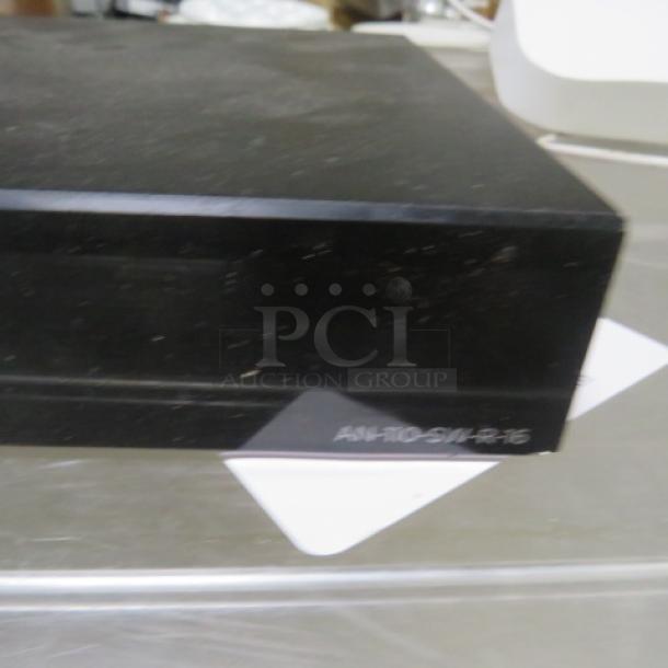 Araknis Gigabit Switch AN-110-SW-R-16 in black, featuring multiple ports, visible label showing model number.