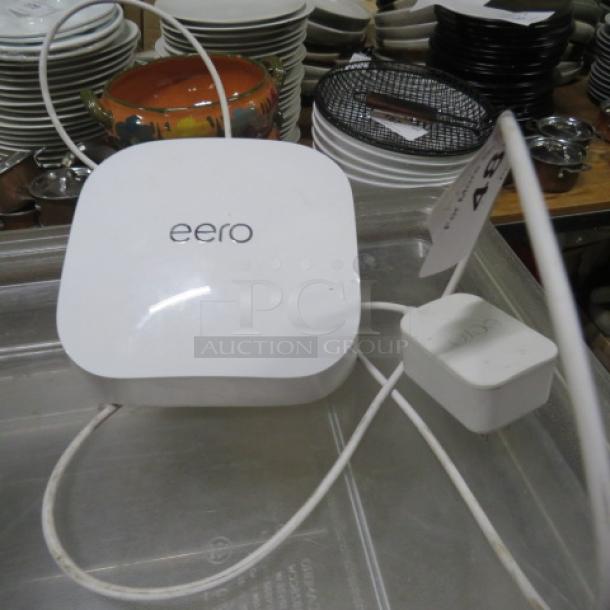 EERO mesh router, white, model #s010001, in good condition, includes original power adapter, auction tag attached.