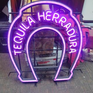 Tequila Herradura electric sign, horseshoe-shaped, neon purple light, working condition.
