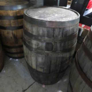 Jack Daniels whiskey barrel, stamped "Jack Daniels Operation Ride Home" on top, wooden, metal bands, good condition.