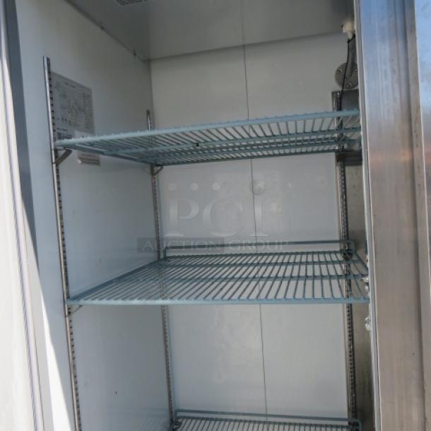 Avantco 2-door refrigerator, model 178A49FHC, includes 6 racks, on casters. Dimensions: 54x32x82.5 inches. 115 Volt.