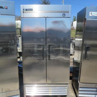 True T-35 two-door refrigerator on casters with six racks. Stainless steel exterior, measures 39.5x30x83.5 inches. 115 Volt.