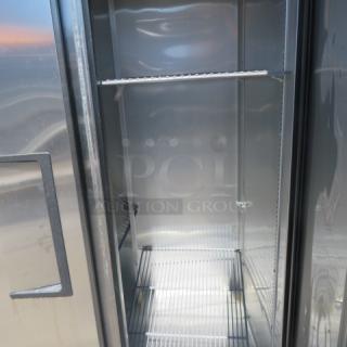 True T-35 2-door refrigerator, stainless steel, 4 racks, on casters, 115V, 39.5x30x83.5 inches, excellent condition.