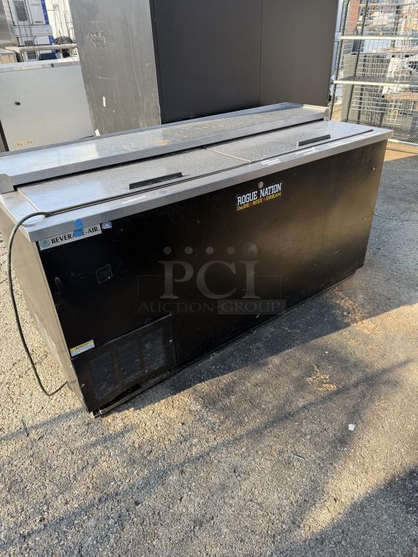 Beverage Air Bottle Box, Model DW64-B, black finish, 65x27x34 inches. Features dual sliding lids, Rogue Nation sticker.