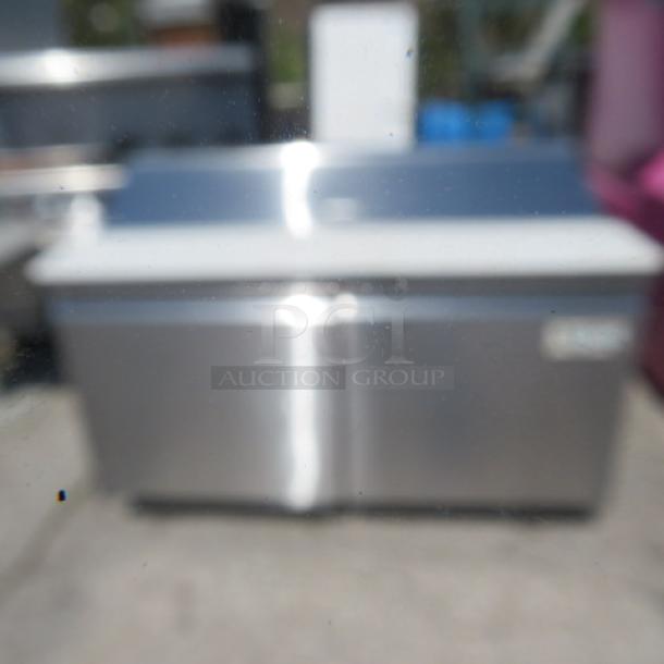 Avantco 2 Door SS Prep Table with Cutting Board, Model 178SSPT60HC, on casters. Dimensions: 60x31x44 inches.