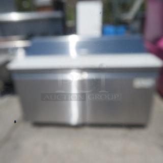 Avantco 2 Door SS Prep Table with Cutting Board, Model 178SSPT60HC, on casters. Dimensions: 60x31x44 inches.