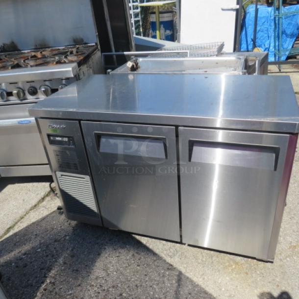 Turbo Air 2-Door Worktop Freezer, Model JUF-48S-N, stainless steel, on casters, 47.5x23.5x32, 115V, includes 1 rack.