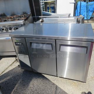 Turbo Air 2-Door Worktop Freezer, Model JUF-48S-N, stainless steel, on casters, 47.5x23.5x32, 115V, includes 1 rack.