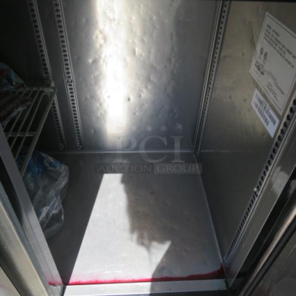 Turbo Air JUF-48S-N 2 Door SS Worktop Freezer, 115V, includes 1 rack, on casters, interior view, labels visible.