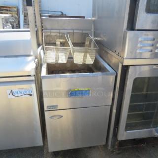Pitco 65C+ natural gas deep fryer, 65-80lb capacity, includes 2 baskets, on casters, stainless steel, 20x34x48 inches.