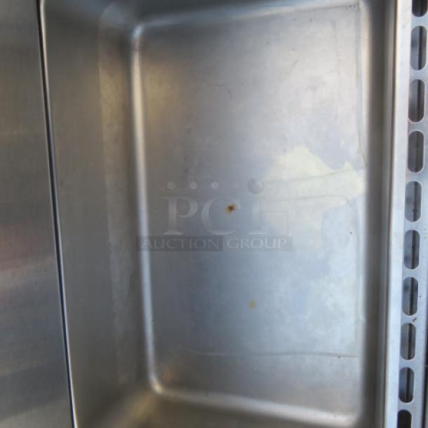 Turbo Air 2 Drawer Refrigerator, Model TUF-28SD-D2-N, stainless steel, interior view, minor wear, on casters.