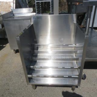 Advance Tabco SS Tiered Under Bar Liquor Display, Model CRLR-24, stainless steel, 24x21x33, on wheels, excellent condition.