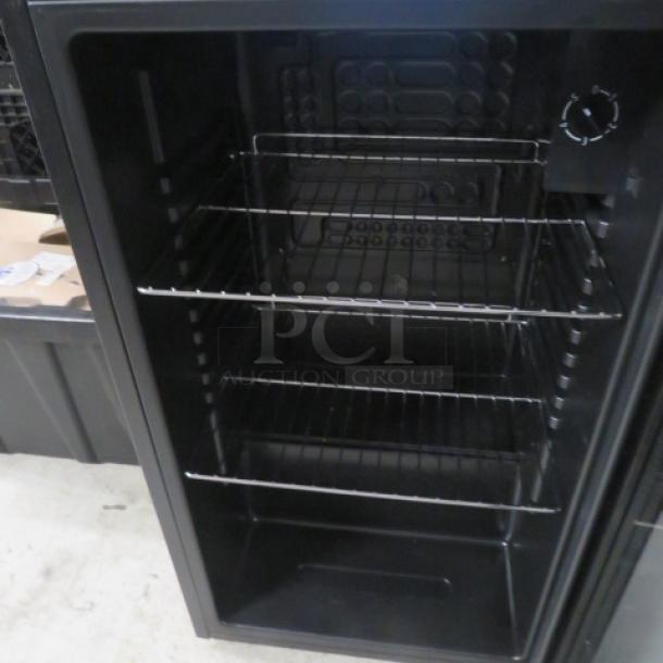 Kuppet Glass Door Refrigerator, Model BG-85Y4, with 2 racks. Measures 19x17x32.5 inches. 115 Volt. Price $309.99.