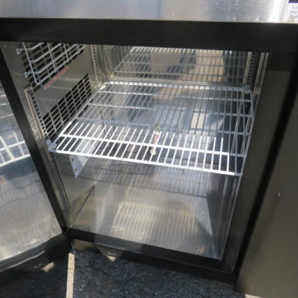 Turbo Air 2-Door Back Bar Cooler, Model TBB-24-60SB-N6, with 1 rack, stainless steel top, on casters, 61x24.5x38 inches.