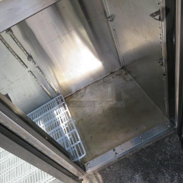 Atosa MBB59GGR 2 Door Glass Back Bar Cooler, 58x27x37, with 4 racks on casters, 115V, inside view.