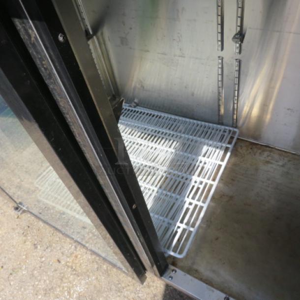 Atosa 2 Door Glass Back Bar Cooler, Model MBB59GGR, with 4 racks, on casters, 115V, 58x27x37 inches, used condition.