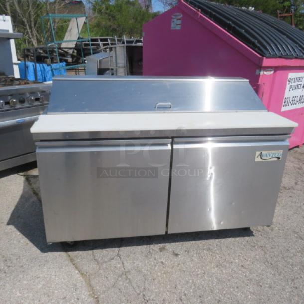 Avantco 2 Door SS Prep Table, Model 178SSPT60HC, 60"x31"x44", with cutting board, on casters. 115 Volt.