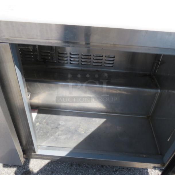 Avantco 2 Door SS Prep Table, Model 178SSPT60HC, with cutting board, on casters, 60"x31"x44", 115V, stainless steel.