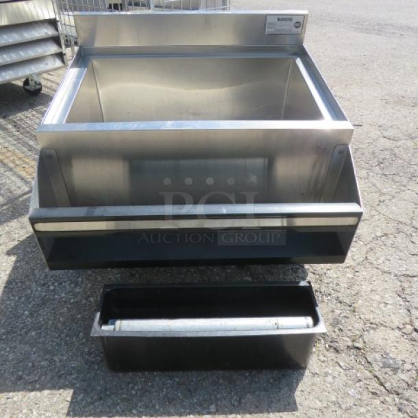 Krowne stainless steel ice well with attached bottle rail, 24x24x35 inches, high-quality condition, model label visible.