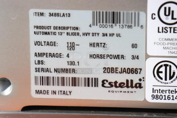 Estella SLA13 13" automatic meat slicer label. 120V, 4A, 3/4 hp. Serial: 20BEJA0667. Made in Italy.