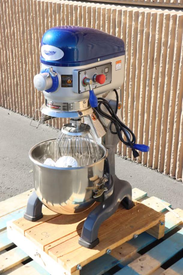 Brand new Vollrath 40757 20 Qt. planetary stand mixer with guard. Includes standard accessories; 120V, 1/2 hp; minor scratches.