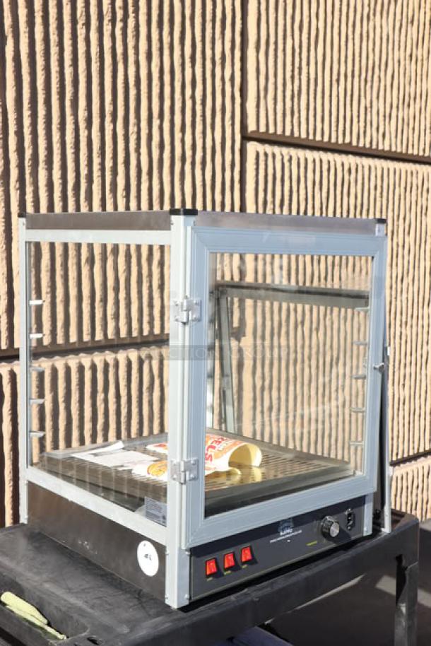 Brand new Carnival King HPW-18D2S 18" full-service warmer, scratch-n-dent condition, model HPW-18D2S, serial 1024.