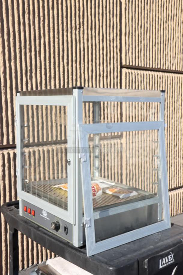 Carnival King HPW-18D2S 18" Full Service Warmer, brand new, scratch-n-dent model. 120V, 500W, clear glass panels, serial no. 1024.