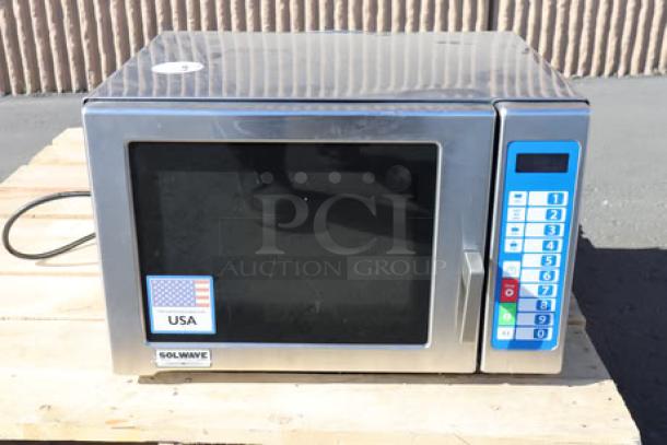 Brand new Solwave Ameri-Series SWA12T commercial microwave, stainless steel, push button controls, slight exterior dent.