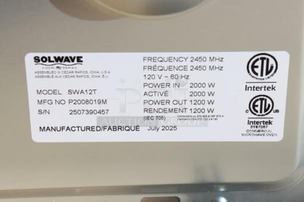 BRAND NEW-UNBOXED Solwave Ameri-Series SWA12T microwave, 1,200W, stainless steel, with minor dents, model details and serial number on label.