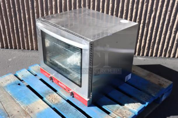 Brand new Avantco CO-28M half-size countertop convection oven, 2.3 cu. ft., 208/240V, 2100/2800W, on pallet.