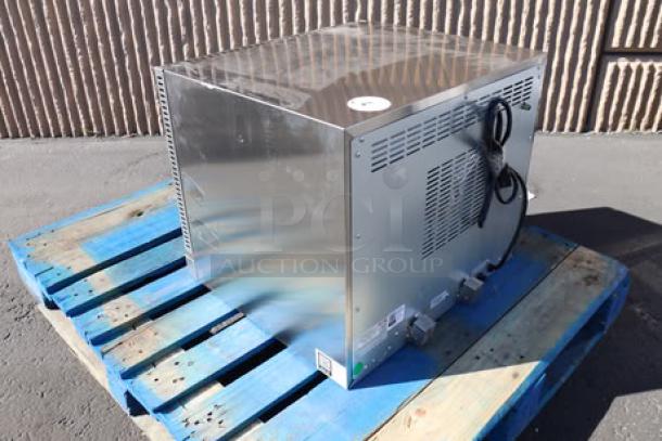 Brand new Avantco CO-28M countertop convection oven, 2.3 cu. ft., 208/240V, 2100/2800W, placed on a pallet.