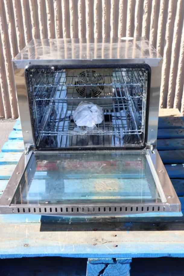 Brand new Avantco CO-28M countertop convection oven, 2.3 cu. ft., 208/240V, 2100/2800W, open door view, serial CO28MC25020105.