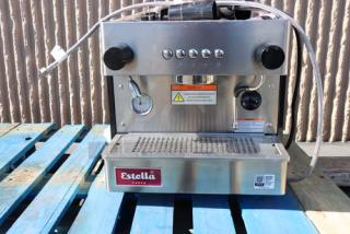 Brand new Estella Caffe ECEM1C one group compact automatic espresso machine, 110V, stainless steel, visible buttons and label.