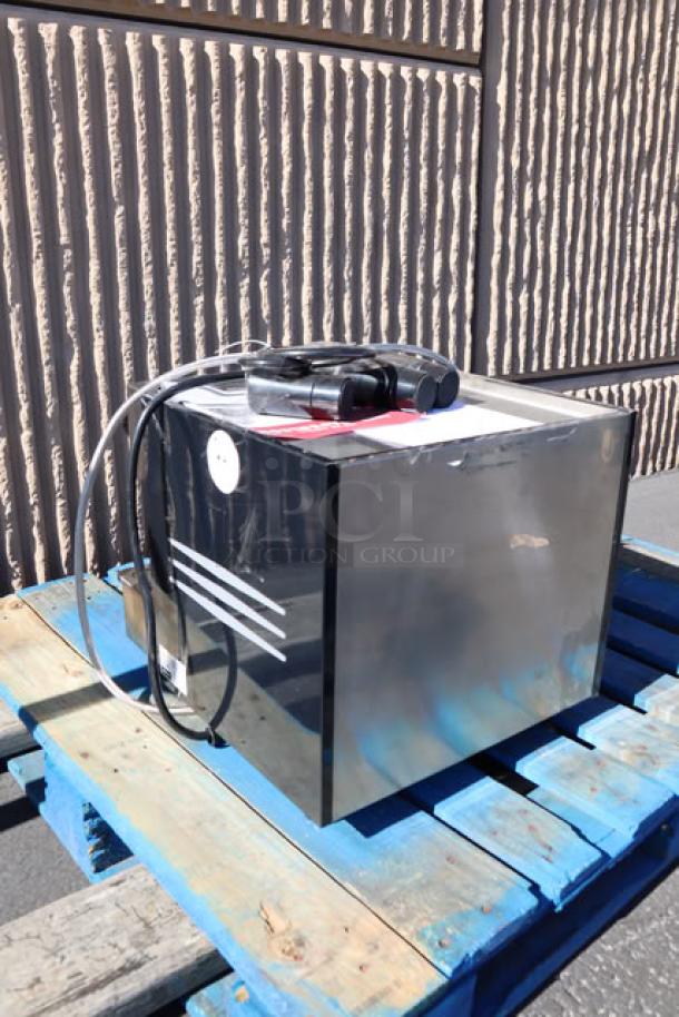 Brand new Estella Caffe ECEM1C espresso machine, compact, automatic, 110V, minor cosmetic dents, on a pallet.