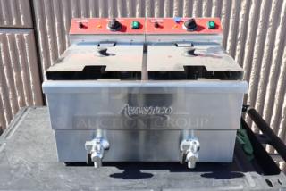 Brand new Avantco F202 dual tank electric fryer, 30 lb capacity, 208-240V, medium-duty, scratch-n-dent, model number visible.