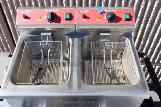 Brand new Avantco F202 dual tank electric fryer, 30 lb. capacity, 208-240V, 5400/7200W. Scratch-n-dent condition.