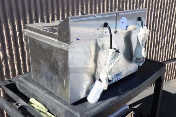 Brand new Avantco F202 dual tank electric fryer, 30 lb. capacity, medium-duty, 208-240V, slight scratches present.