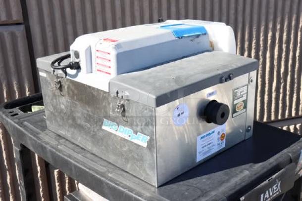 Brand new Thermaco Big Dipper W-200-IS 47 lb. automatic grease trap. Scratch and dent condition. Visible labels show model and brand.