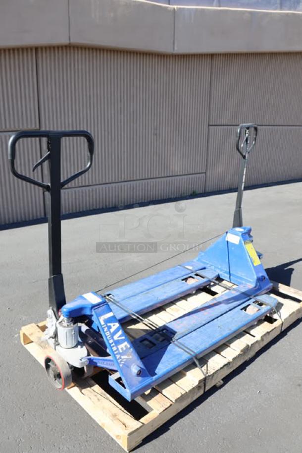 Lavex 27" x 48" manual pallet jacks, 6600 lb. capacity, shown on a pallet. Includes two units. Blue with visible brand marking.