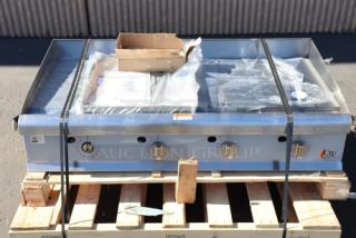 BRAND NEW-OUT OF BOX! Cooking Performance Group GT-CPG-48-NL 48" gas griddle. Bent corners, missing one knob, 120,000 BTU.