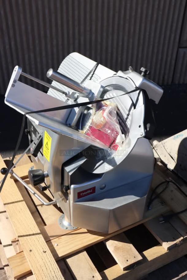 Estella SLA13 13" heavy-duty automatic meat slicer, brand new, scratch-and-dent condition, 3/4 hp, shown on a pallet.