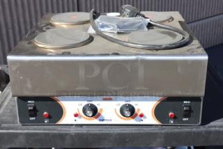 Brand new Nemco 6311-4-240 electric hot plate, 4 burners, 240V, superficial denting, S/N: 25090814.